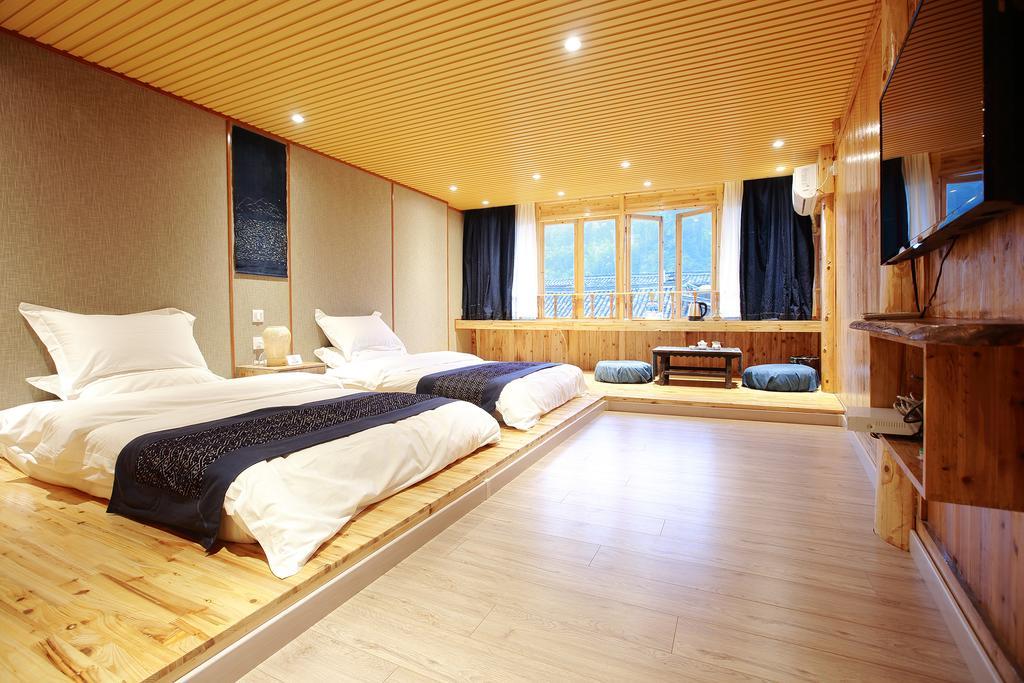 Tong Sang Art Hotel Liping Esterno foto