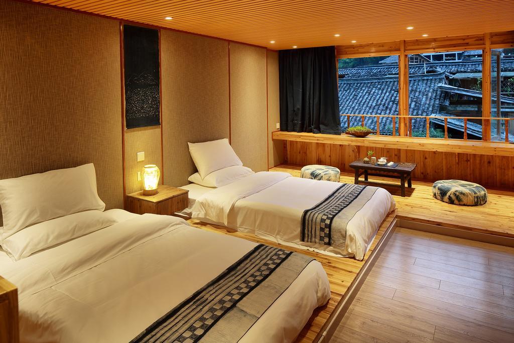 Tong Sang Art Hotel Liping Esterno foto