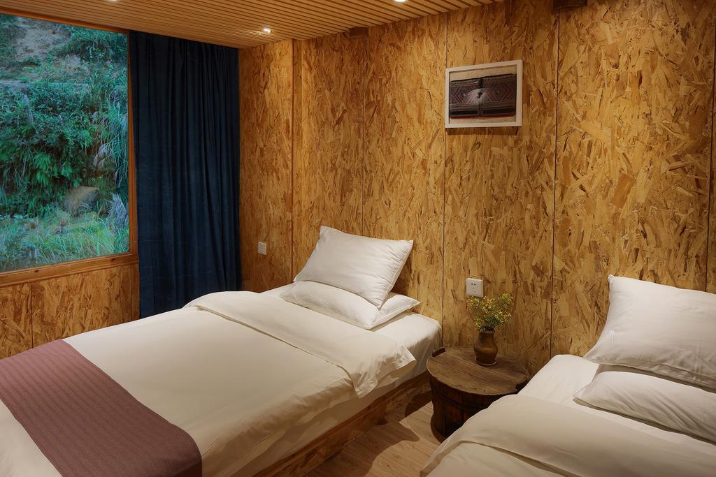 Tong Sang Art Hotel Liping Esterno foto