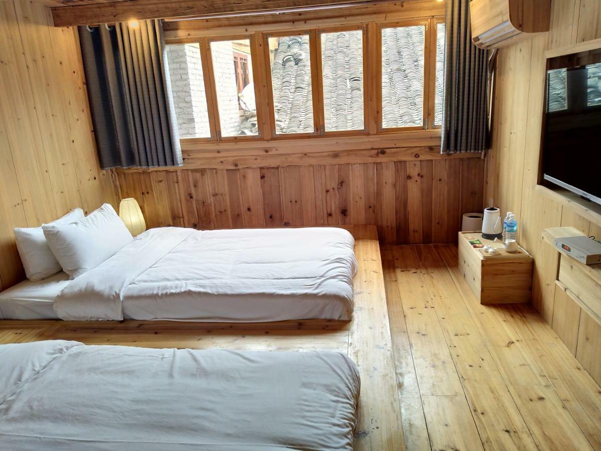 Tong Sang Art Hotel Liping Esterno foto