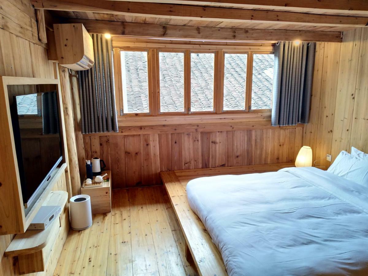 Tong Sang Art Hotel Liping Esterno foto